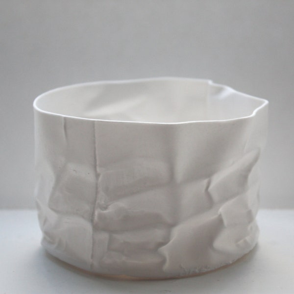 Crumpled paper looking white vessel made out of English fine bone china