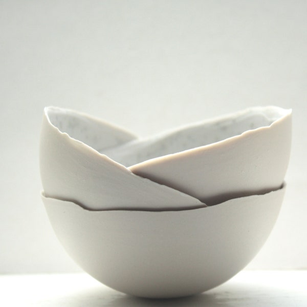 Porcelain bowl. Stoneware Parian porcelain bowl in mushroom color with mat interior and crystals.