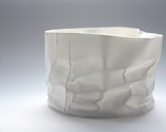 White vase. Crumpled paper looking vessel made out of English fine bone china with a hint of mother of pearl - iridescent