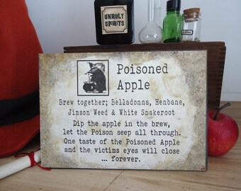 Poison apple and food safety concept as a rotten fruit with a