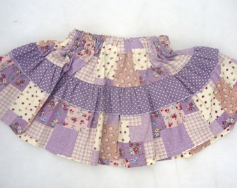 Purple patchwork print skirt to fit age 3-5 years