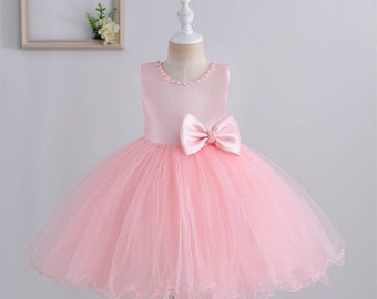 Girls pink dress, flower girl dress, party dress, occasion dress, wedding, boutique, big bow, pearl detailing, princess, tulle