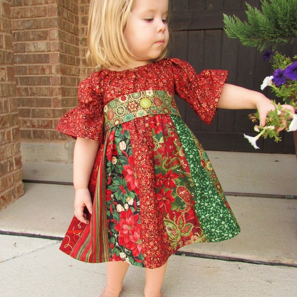 Child's stripwork peasant dress for Christmas. Girls Christmas dress in sizes 6 months, 12 month, 2t, 3t, 4t, 5, 6, 7, and 8.