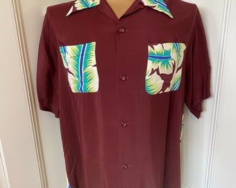 Rare maroon rayon Hawaiian shirt by Aloha Kanaka with amazing print