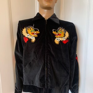 Black velvet Japanese souvenir jacket with embroidered dragons and a map of Japan