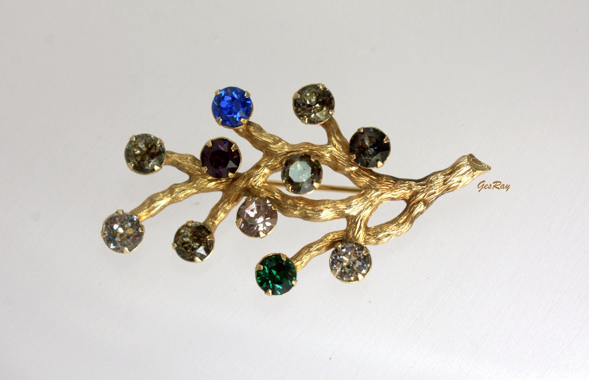 Van dell deals brooch