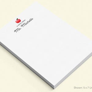 a blank white notepad with a personalized message printed on it.
