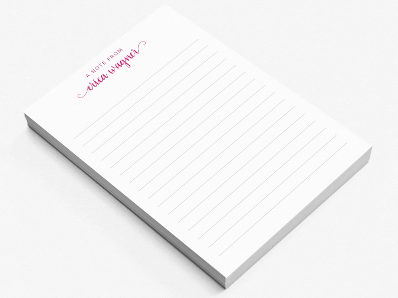 A blank lined notepad with the text "A Note From" printed in pink cursive font.