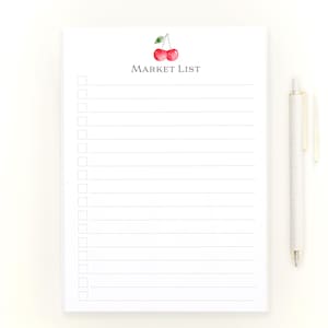 May include: A white notepad with a red cherry illustration and the text "MARKET LIST" at the top. The notepad has a lined interior and a checklist with empty boxes.