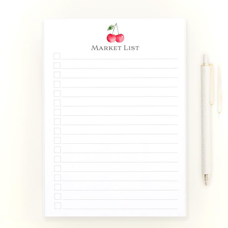 May include: A white notepad with a red cherry illustration and the text "MARKET LIST" at the top. The notepad has a lined interior and a checklist with empty boxes.