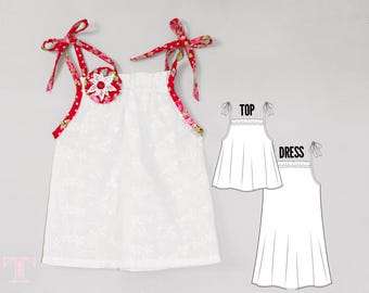 May include: White sleeveless top with red floral trim and a red fabric flower with a white button in the center. The top has two red fabric ties. A line drawing of the top and a longer version of the top labeled "Top" and "Dress" are shown.