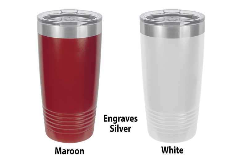 May include: Two stainless steel tumblers, one maroon and one white, with silver lids. The tumblers have a textured design and the text "Engraves Silver" is printed below the tumblers.