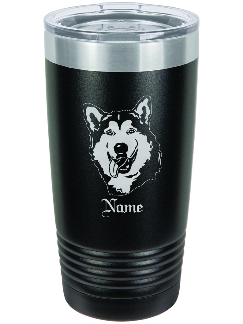 May include: Black stainless steel tumbler with a white Alaskan Malamute dog graphic and the word "Name" engraved on the side.