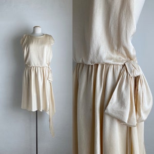 cream colored cap sleeve drop waist dress BABEYOND Vintage 1950s Swing Dress with Cape Sleeves, Elegant 1950s Cocktail Party Dress, Black, Size S
