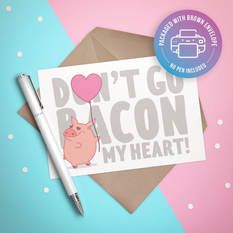May include: A white card with a pink pig holding a pink heart balloon. The card says "Don't go bacon my heart!"