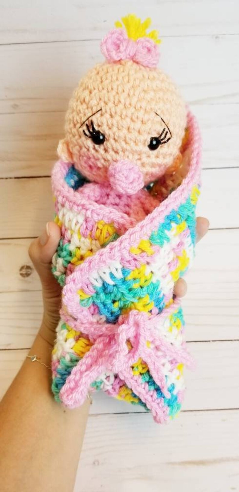 baby doll with blanket