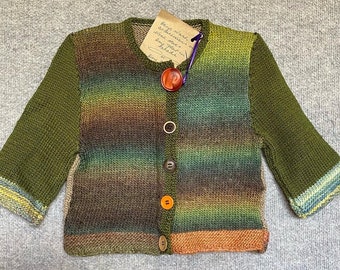 Child's hand-knitted cardigan.