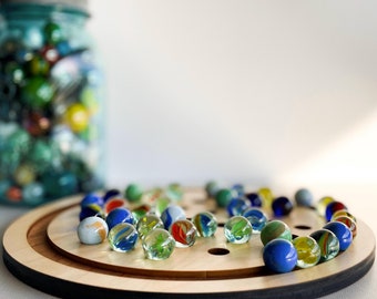 Marble Solitaire Game, wooden board with marbles