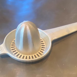 Vintage Foley Aluminum Citrus Juicer: Retro Kitchen Tool