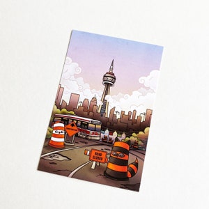 Carte postale Ponto le cône orange Toronto raton laveur illustration kawaii