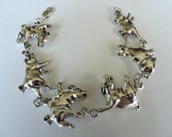 Sterling Silver Tumbling Pigs Bracelet