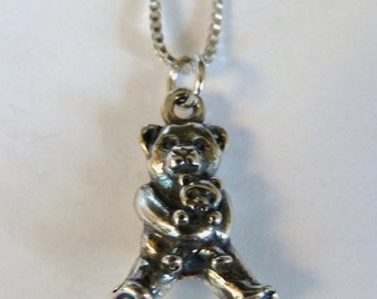 Sterling Silver Teddy Bear Holding Teddy Bear Necklace