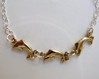 Sterling Silver and Bronze Three Dolphin Bracelet with Sterling Heart Dangle