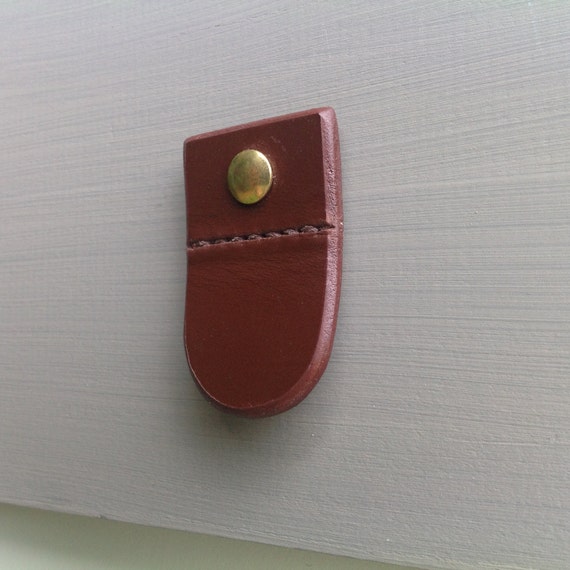 leather pull tab