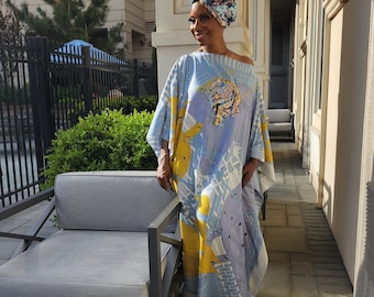 LiiLiiGiirl Kaftan Dress,  Soft blue and gold Kaftan dress with Sequin Afro-girl face