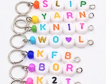 White/multicolour alphabet/word knitting stitch markers - set of 8