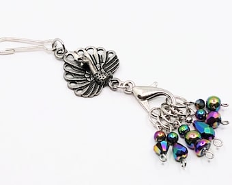 Peacock stitch marker holder with 6 removable purple/green/iridescent knitting stitch markers