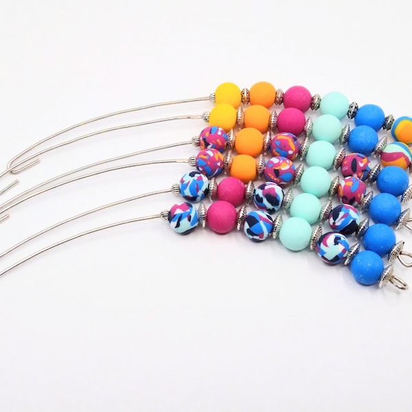 Multicoloured polymer clay bead spinning wheel orifice hook/threader