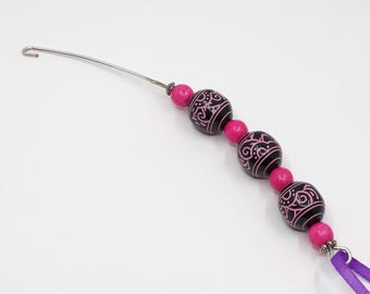 Pink and black beaded spinning wheel orifice hook/threader