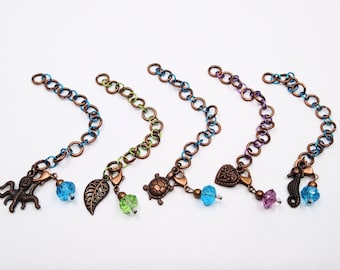 Small copper tone row counter/stitch marker with progress keeper - counts to 109.