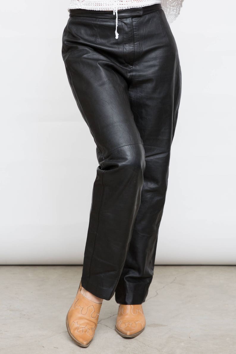 black trousers with silver side stripe