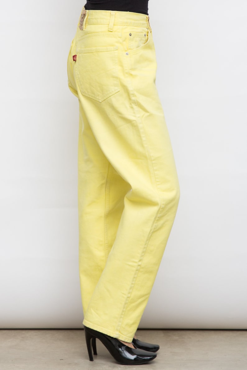 yellow jean pants