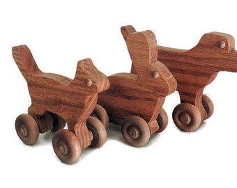 Wooden toy animals, wooden toy animals on wheels, wooden cat,  wooden dog, wooden rabbit