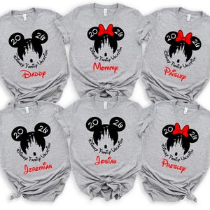 May include: Six gray t-shirts with a Disney Family Vacation design. Each shirt features a Mickey Mouse head with the year "2020" and a castle silhouette. Names "Daddy", "Mommy", "Paisley", "Jeremiah", "Josiah", and "Presley" are printed below.
