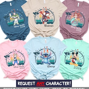 May include: Assorted-color Disney vacation t-shirts featuring various characters like Buzz Lightyear, Spider-Man, Ariel, Judy Hopps, Stitch, and Mickey Mouse. Each shirt has "Disney Vacation 2026" or "2024" printed on it. The text "REQUEST ANY CHARACTER!" is also visible.