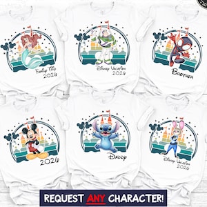 May include: White t-shirts featuring various cartoon characters like Ariel, Buzz Lightyear, and Mickey Mouse. Each shirt has a unique design with text such as "Family Trip 2026" and "Disney Vacation 2026". The shirts are part of a Disney-themed collection.