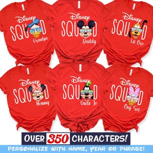 May include: Red t-shirts with Disney character graphics and the word "SQUAD". Each shirt features a different character: Donald Duck, Mickey Mouse, Pluto, Minnie Mouse, Goofy, and Daisy Duck. Text on the shirts includes "Grandpa", "Daddy", "Lil Bro", "Mommy", "Uncle Jo", and "Big Sis".