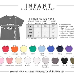 May include: A Rabbit Skins 3322 infant fine jersey t-shirt size chart featuring a gray t-shirt illustration, a measurement table in inches for sizes 6M to 24M, and a color palette showing sixteen available shirt colors with their names.