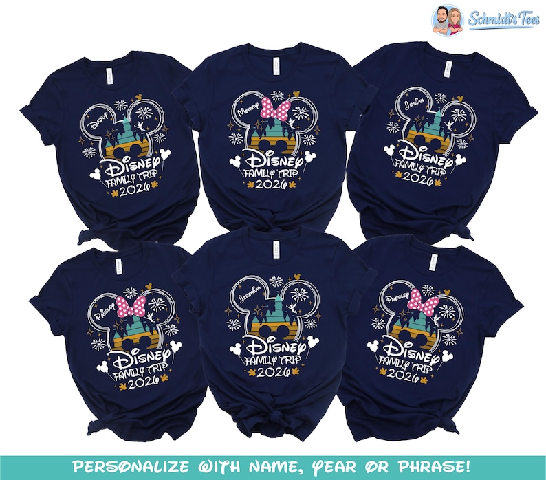 May include: Navy blue t-shirts with a Disney theme. Each shirt features a Mickey Mouse head design with the text "Disney Family Trip 2026". Some shirts have names like "Mommy" and "Josim" printed above the design.