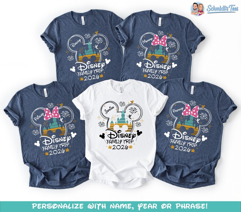 May include: Five short-sleeved t-shirts. Four are navy blue, and one is white. Each shirt features a Disney-themed graphic with the text "Disney Family Trip 2026". Some shirts have names like "Daddy" and "Mommy".