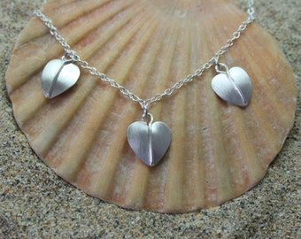 Sterling silver heart necklace.