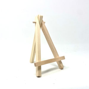 Mad J Gifts wood easel for mini canvas prints.