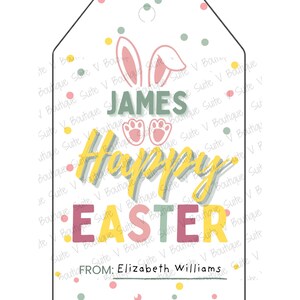 May include: A white Easter gift tag with a bunny ears graphic and the name "James". The tag features the text "Happy Easter" in yellow and pink, with the words "From: Elizabeth Williams" at the bottom.