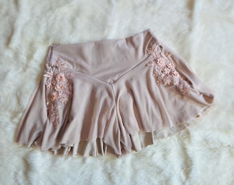 Pantalones cortos acampanados de bambú con bolsillos