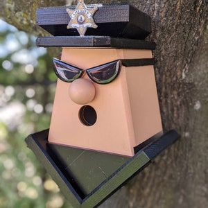 Personalisierte Polizistin Vogelhaus