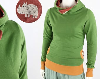 Women's green hoodie with rhinos